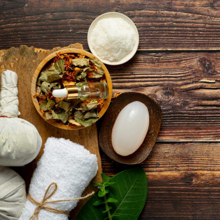 herbal spa treatment equipments put on wooden floor